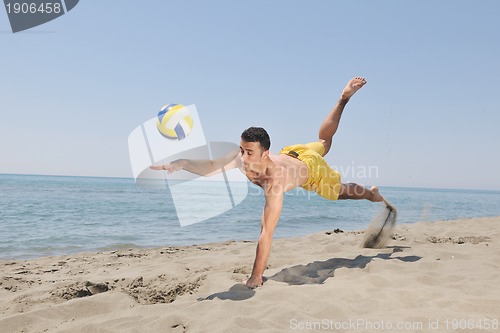 Image of male beach volleyball game player