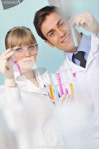 Image of science people in bright lab