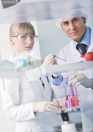 Image of science people in bright lab