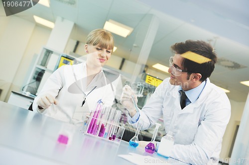 Image of science people in bright lab