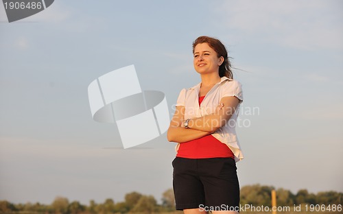 Image of young woman enjoy on beach