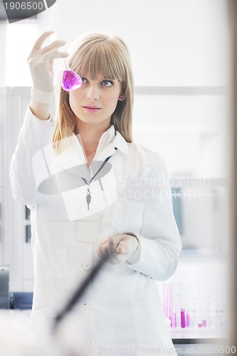 Image of science people in bright lab