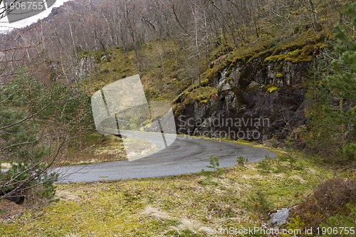 Image of run-down road in rural landscape