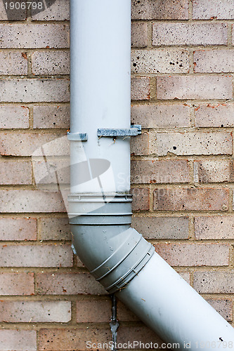 Image of Brick Wall with Drain Pipe