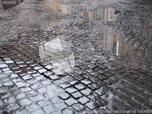 Image of Wet cobbled street in Rome