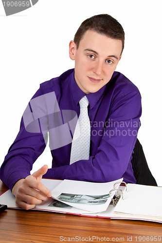 Image of Employee reading files