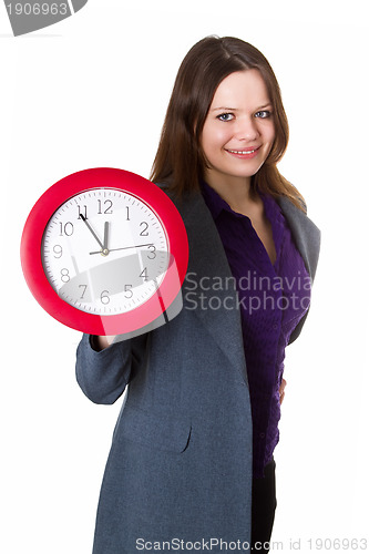 Image of Woman holding a clock