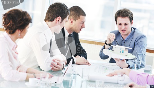 Image of group of business people at meeting