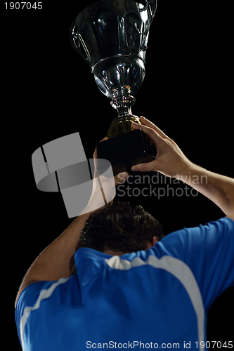 Image of soccer players celebrating victory