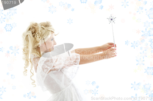 Image of fairy with magic wand and snowflakes