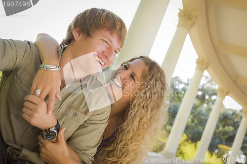 Image of Attractive Loving Couple Portrait in the Park