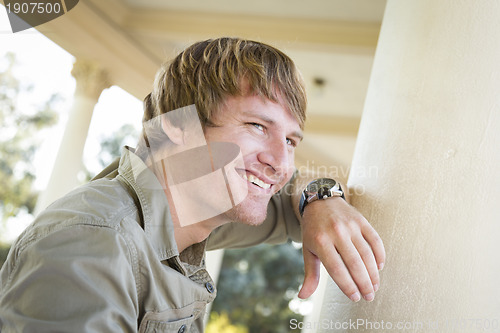 Image of Handsome Smiling Young Man Portrait Outside