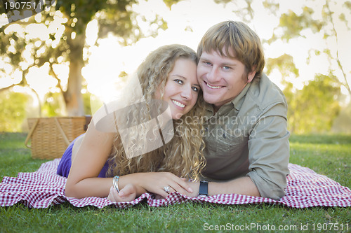 Image of Attractive Loving Couple Portrait in the Park