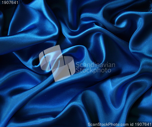 Image of Smooth elegant blue silk can use as background 