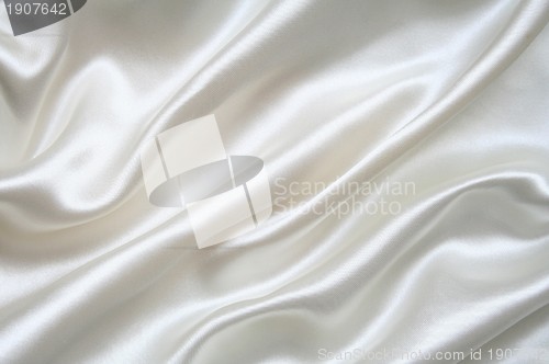 Image of Smooth elegant white silk as background 