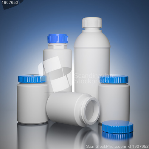 Image of Pill Bottles on Blue Background.