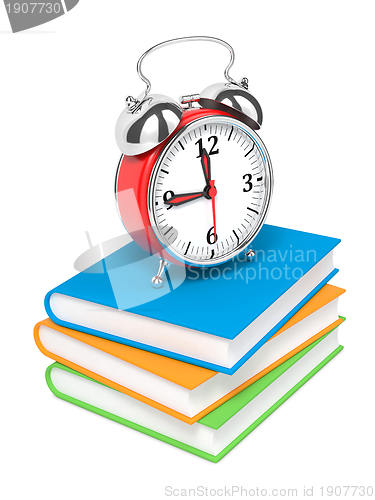 Image of Alarm Clock on Pile of Books.