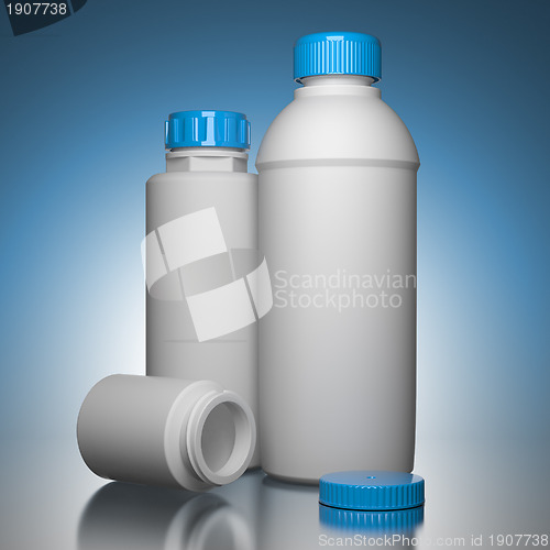 Image of Pill Bottles on Blue Background.