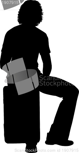 Image of Silhouette of man with suitcase