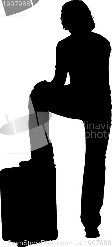 Image of Silhouette of man with suitcase