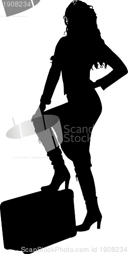 Image of Silhouette of a woman traveling