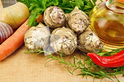 Image of Jerusalem artichokes with vegetables on the board