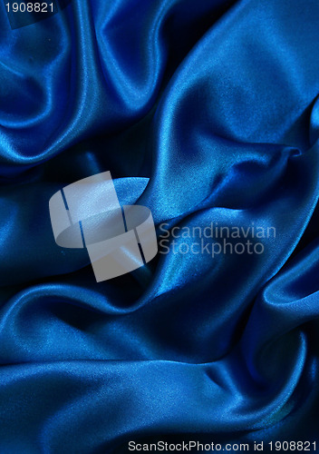 Image of Smooth elegant blue silk can use as background 