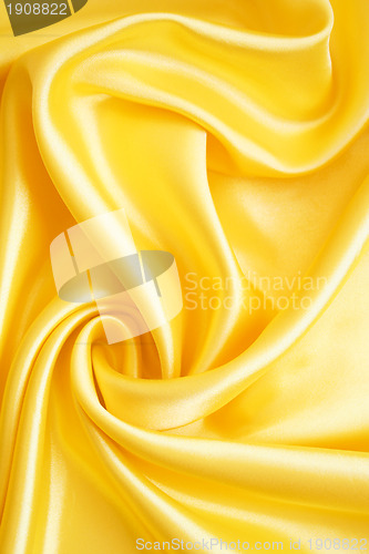 Image of Smooth elegant golden satin as background 