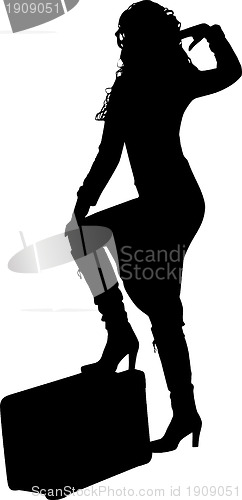 Image of Silhouette of a woman traveling