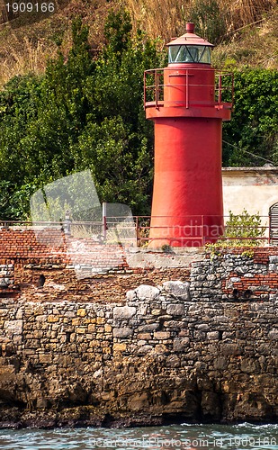 Image of small red lighthouse