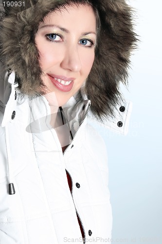 Image of Winter woman in a hooded parka