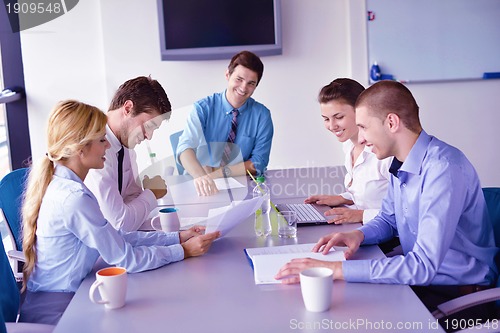 Image of business people in a meeting at office