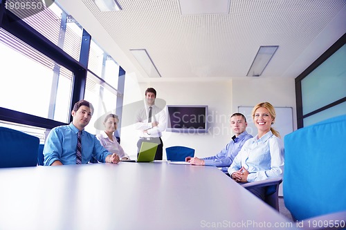 Image of business people in a meeting at office