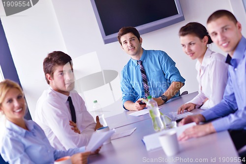 Image of business people in a meeting at office