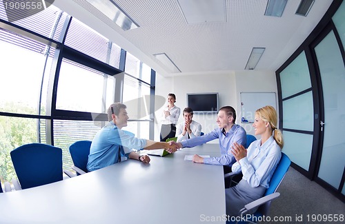 Image of business people in a meeting at office