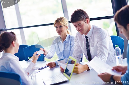 Image of business people in a meeting at office