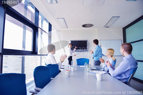 Image of business people in a meeting at office