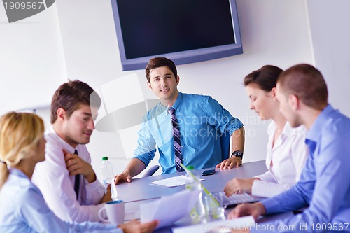 Image of business people in a meeting at office