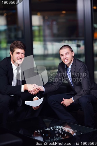 Image of business people making deal