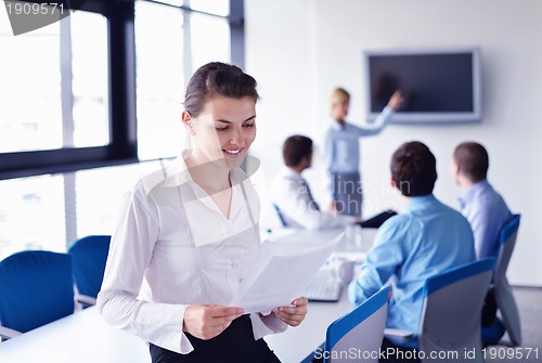 Image of business people in a meeting at office