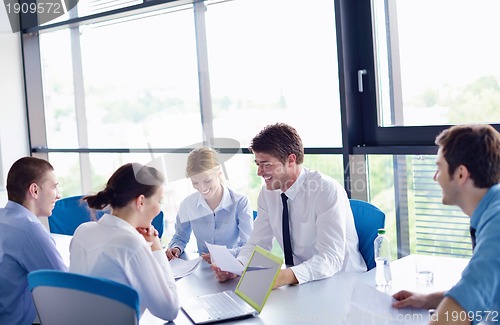 Image of business people in a meeting at office