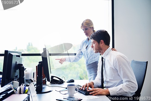 Image of business people in a meeting at office