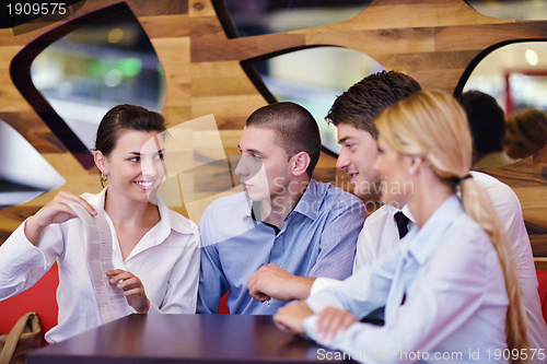 Image of business people in a meeting at office