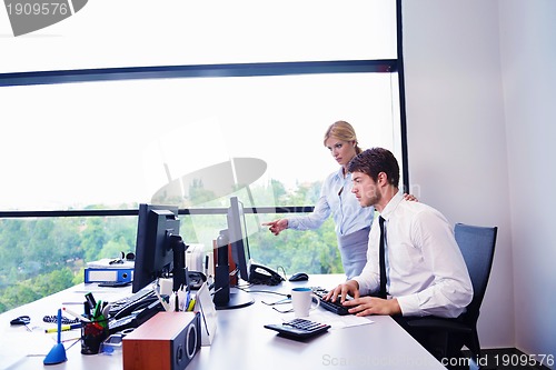 Image of business people in a meeting at office