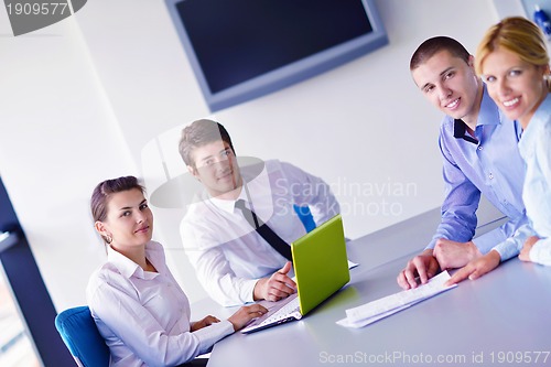 Image of business people in a meeting at office