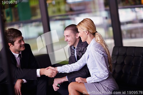 Image of business people making deal