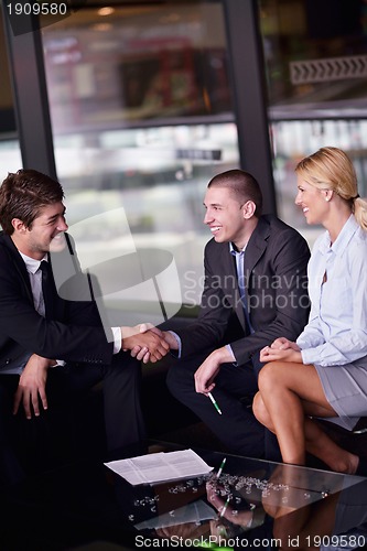 Image of business people in a meeting at office