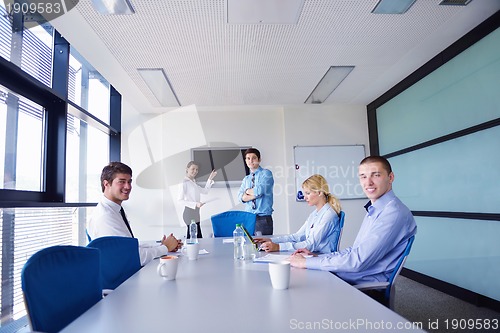 Image of business people in a meeting at office