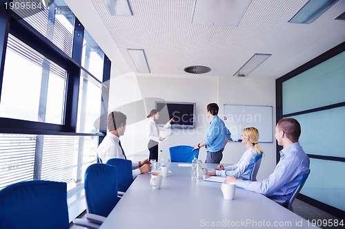 Image of business people in a meeting at office