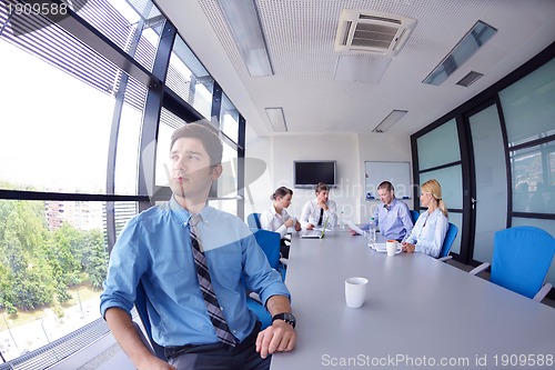 Image of business people in a meeting at office